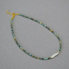 TURQUOISE ENHANCES INTERPERSONAL RELATIONSHIPS NECKLACE_1