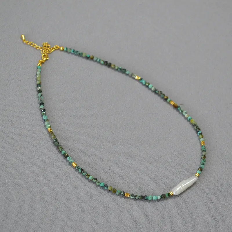 TURQUOISE ENHANCES INTERPERSONAL RELATIONSHIPS NECKLACE_1