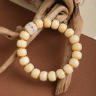 TIBETAN CAMEL BONE BUCKET BEAD BRACELETS_1