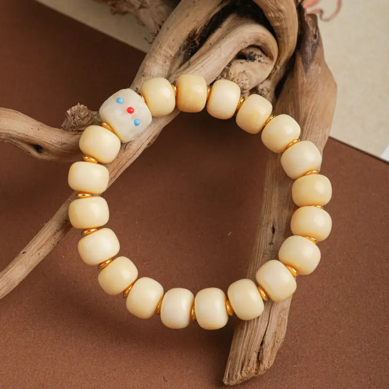 TIBETAN CAMEL BONE BUCKET BEAD BRACELETS_1