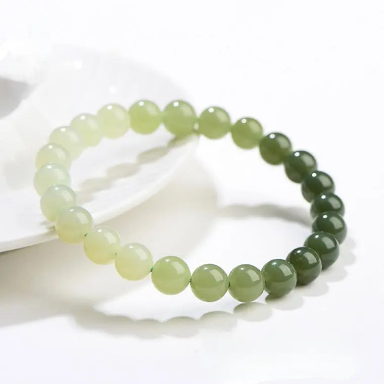 QINGSHUI HETIAN JADE ROUND BEAD BRACELET_1